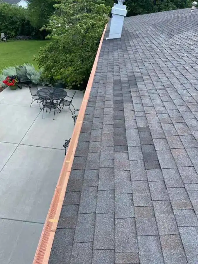 Gutter repaired along the roof edge of a St. Louis home