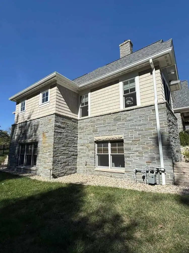 Close view of a seamless gutter run along the fascia