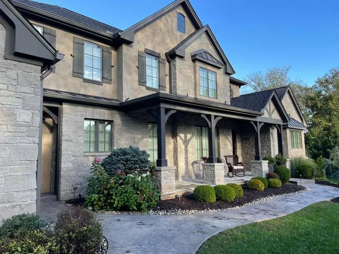 St. Louis area home with seamless gutters and downspouts