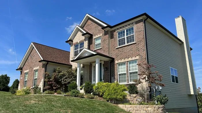 St. Louis area home with seamless gutters and downspouts