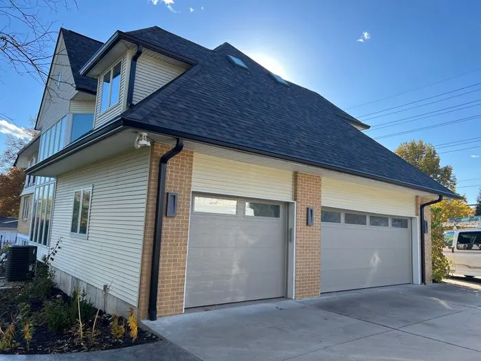 St. Louis area home with seamless gutters and downspouts