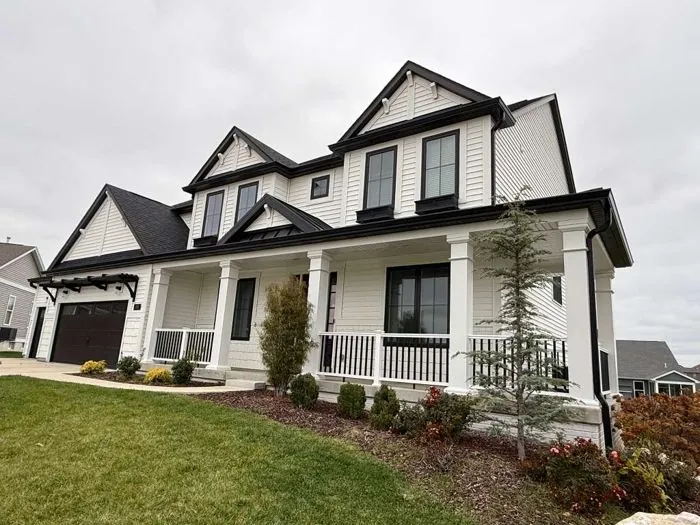 St. Louis area home with seamless gutters and downspouts